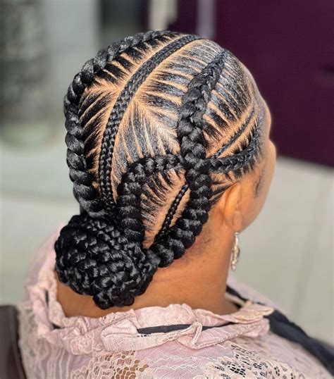 feedin braids in a bun|high bun with braids.